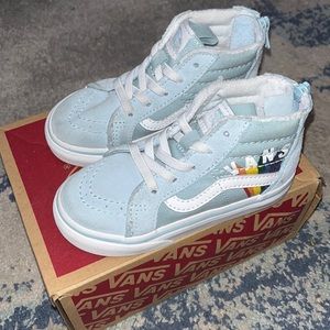 Vans with rainbow